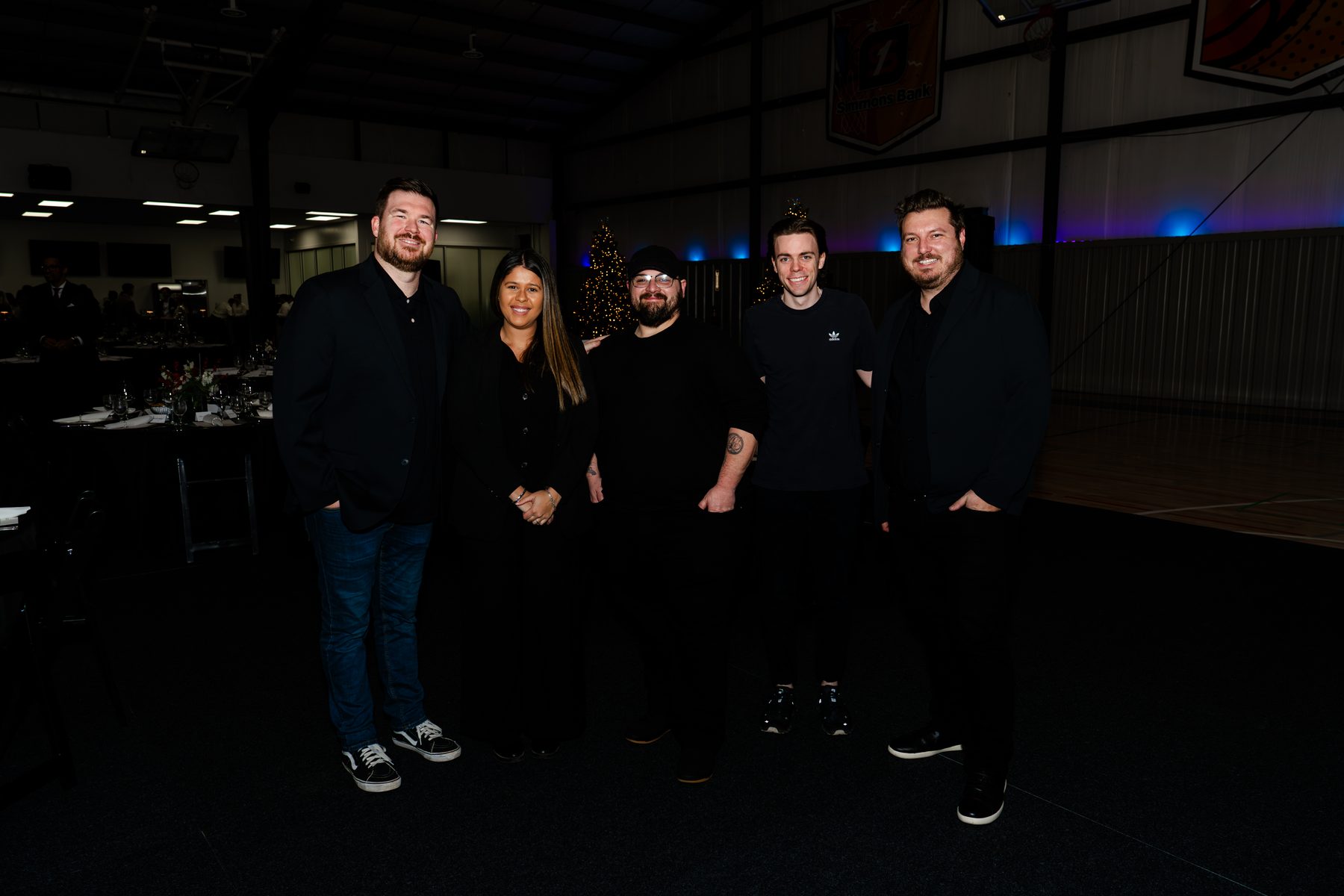 A professional video production team at a formal client event in Arkansas